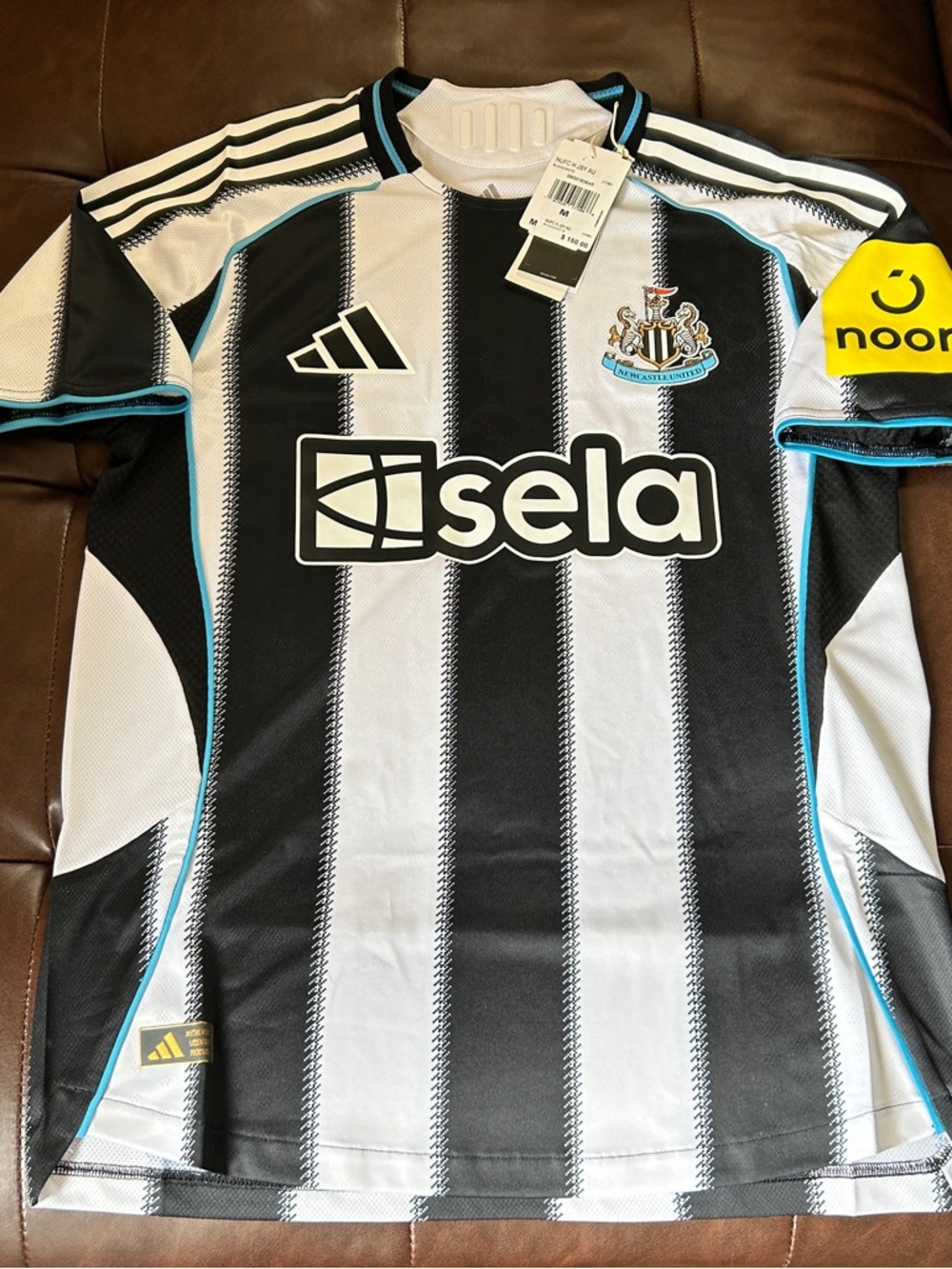 adidas Black & White Newcastle United Striped Soccer Jersey with Blue Trim
